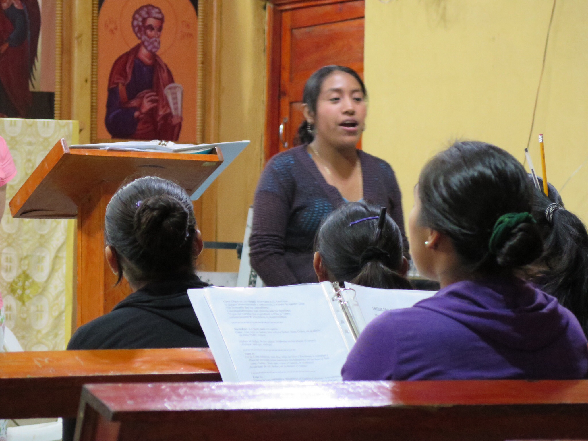 Juanita leads the choir in Aguacate