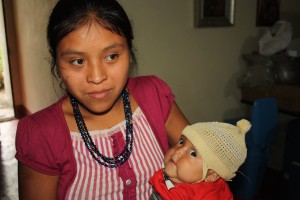 Mother brings malnourished daughter to clinic for evaluation.