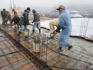 Pouring the cement of the 2nd floor roof