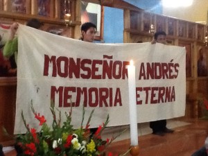 Seminarians hold banner commemorating the 1 year anniversary of  Fr. Andres' falling asleep